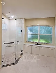 Neo-Angle Frameless Shower Door by Vitralum